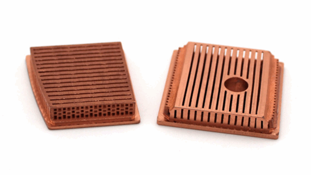 Two pure copper heat sinks with parallel grooves are shown side by side; one features a central hole and both have fin-like structures for efficient heat dissipation.